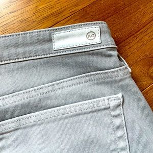 AG Stilt Crop/Cigarette crop skinny jeans in light grey.